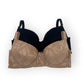 Brown bra with floral lace details on a white background