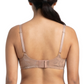 Woman wearing beige lingerie set on a white background