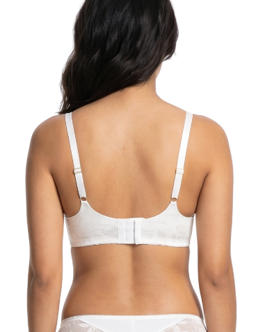 Woman wearing a white bra on a white background