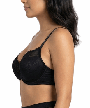 Woman wearing a black bra on a white background