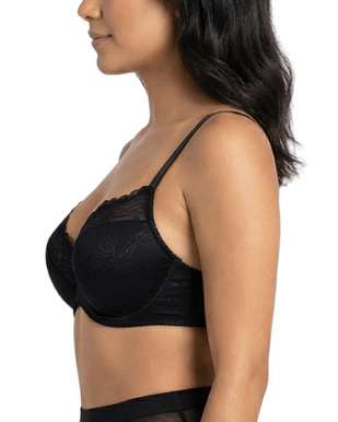 Woman wearing a black bra on a white background