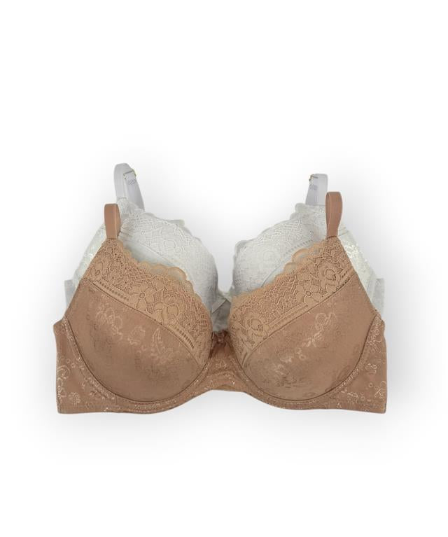 Nude bra with lace details on a white background