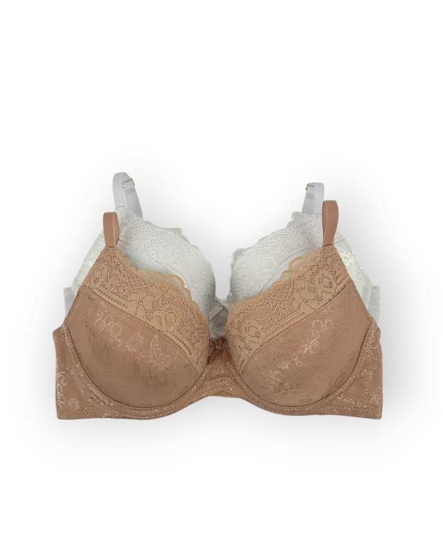 Nude bra with lace details on a white background