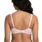 Woman wearing a light pink lingerie bra on a white background