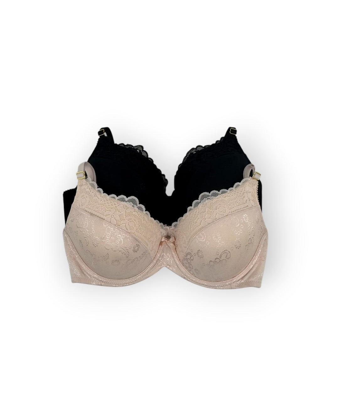Beige bra and black bra on a white background