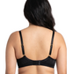 Woman wearing a black lace bra on a white background