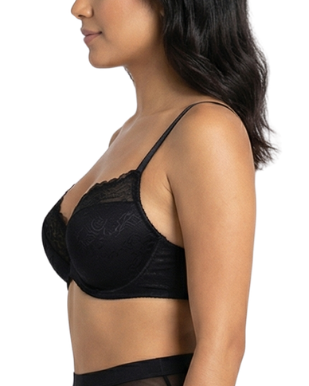 Woman wearing a black bra on a white background