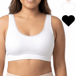 Woman wearing a white comfort bra on a white background