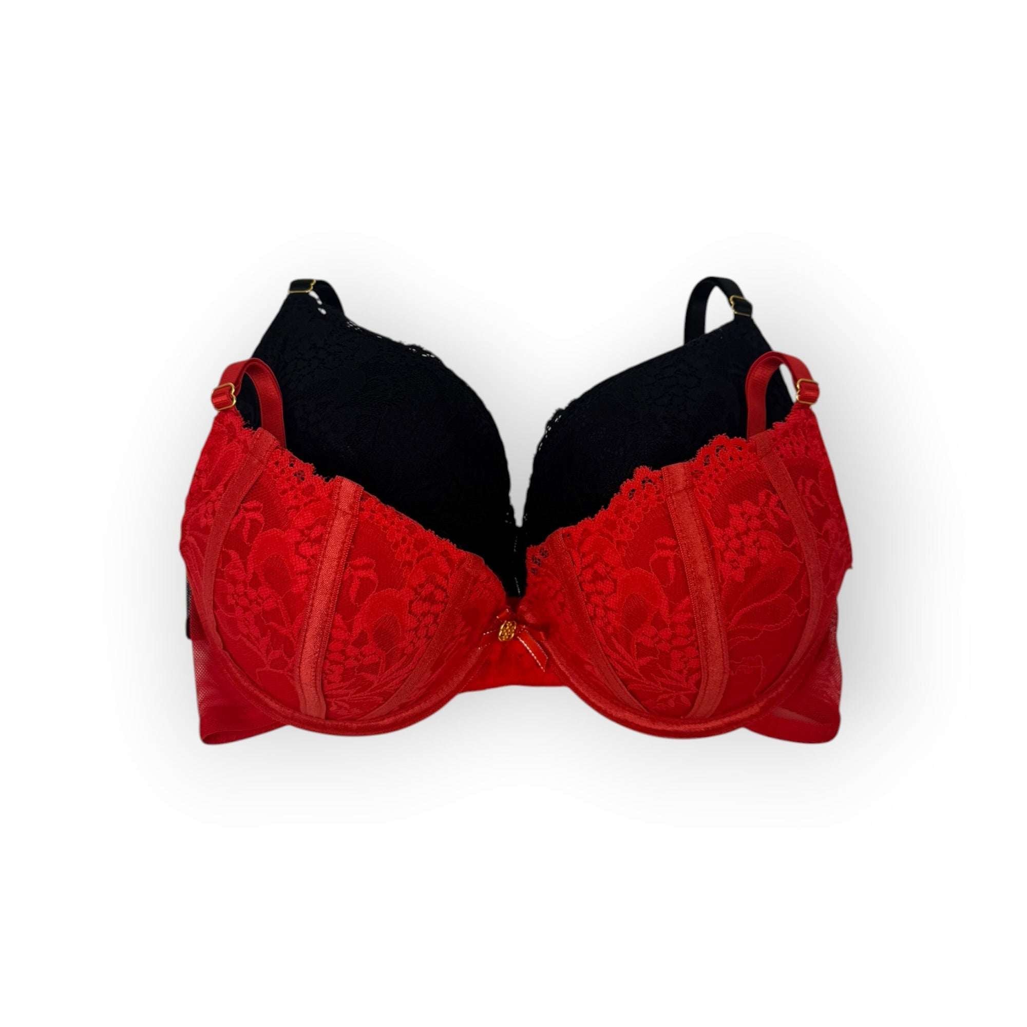 Red lace and black lace bra on a white background