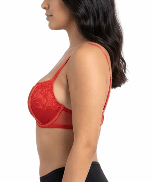 Woman wearing a red lace bra on a white background