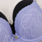 Light blue bra with lace details on a white background