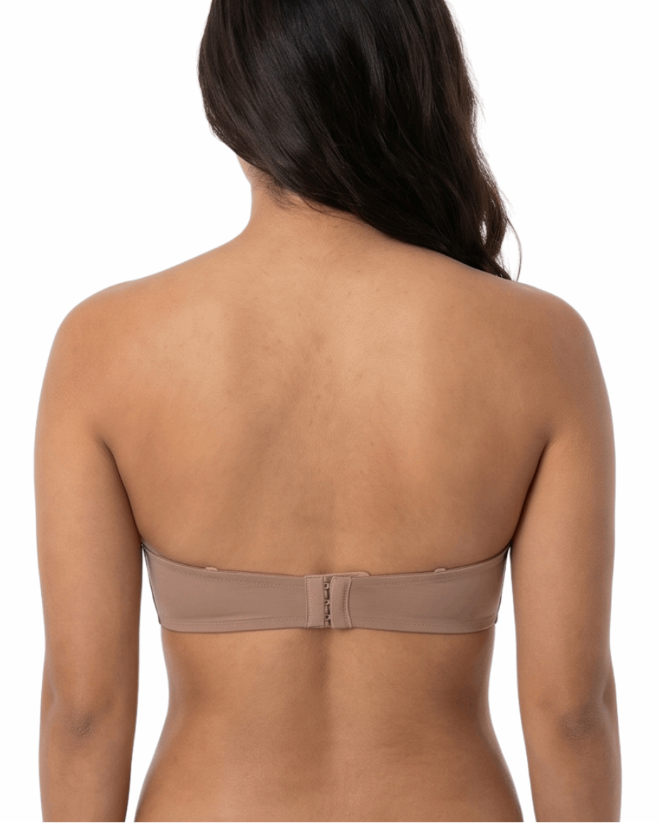 Woman wearing a mocha strapless bra on a white background