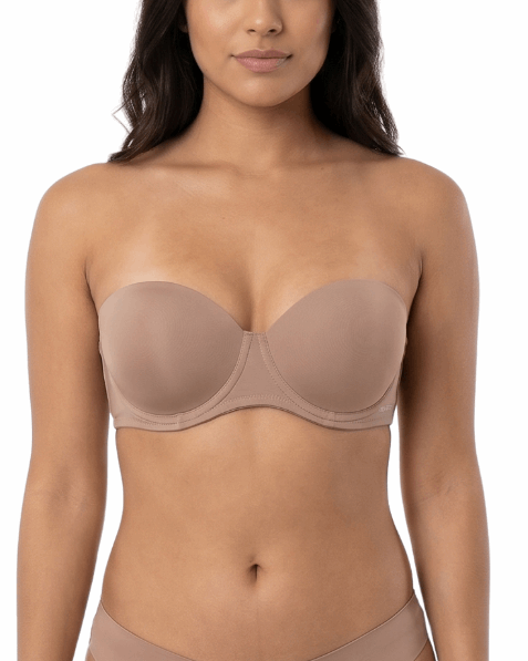 Woman wearing a mocha strapless bra on a white background