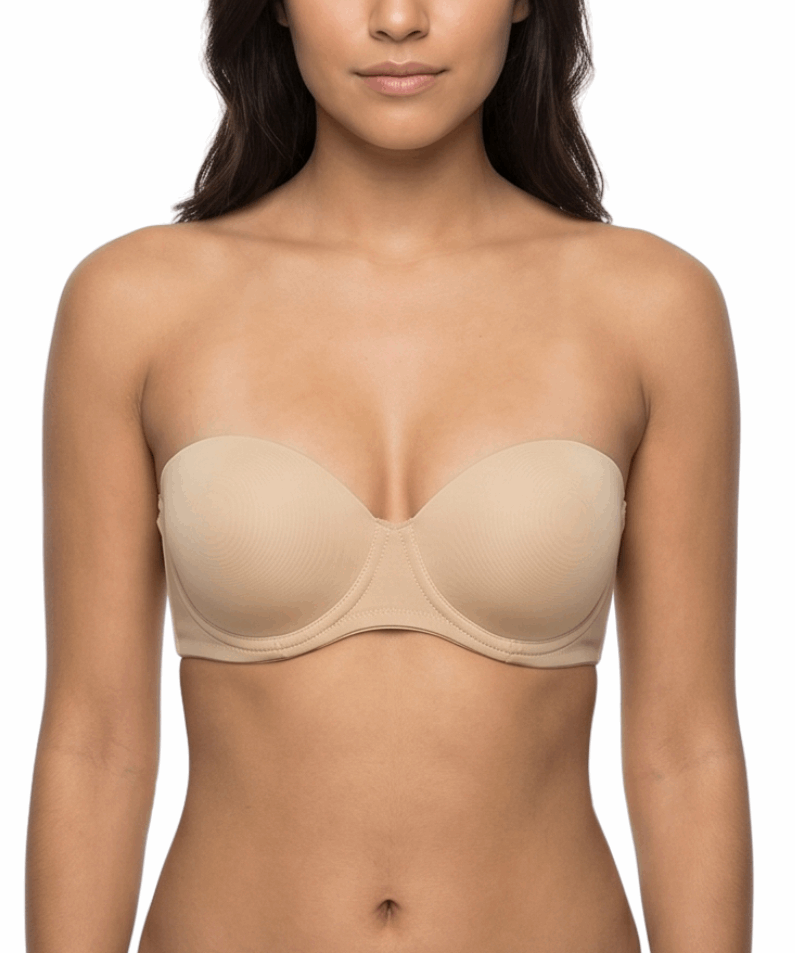 Woman wearing a nude strapless bra on a white background