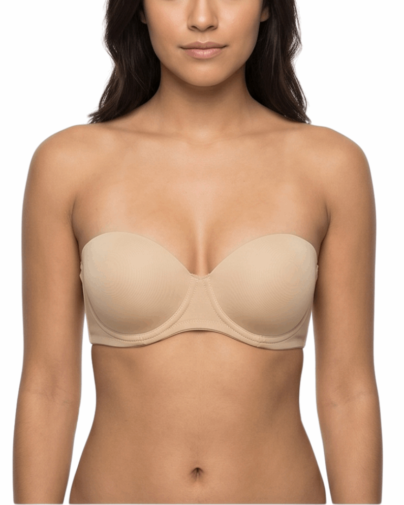 Woman wearing a nude strapless bra on a white background