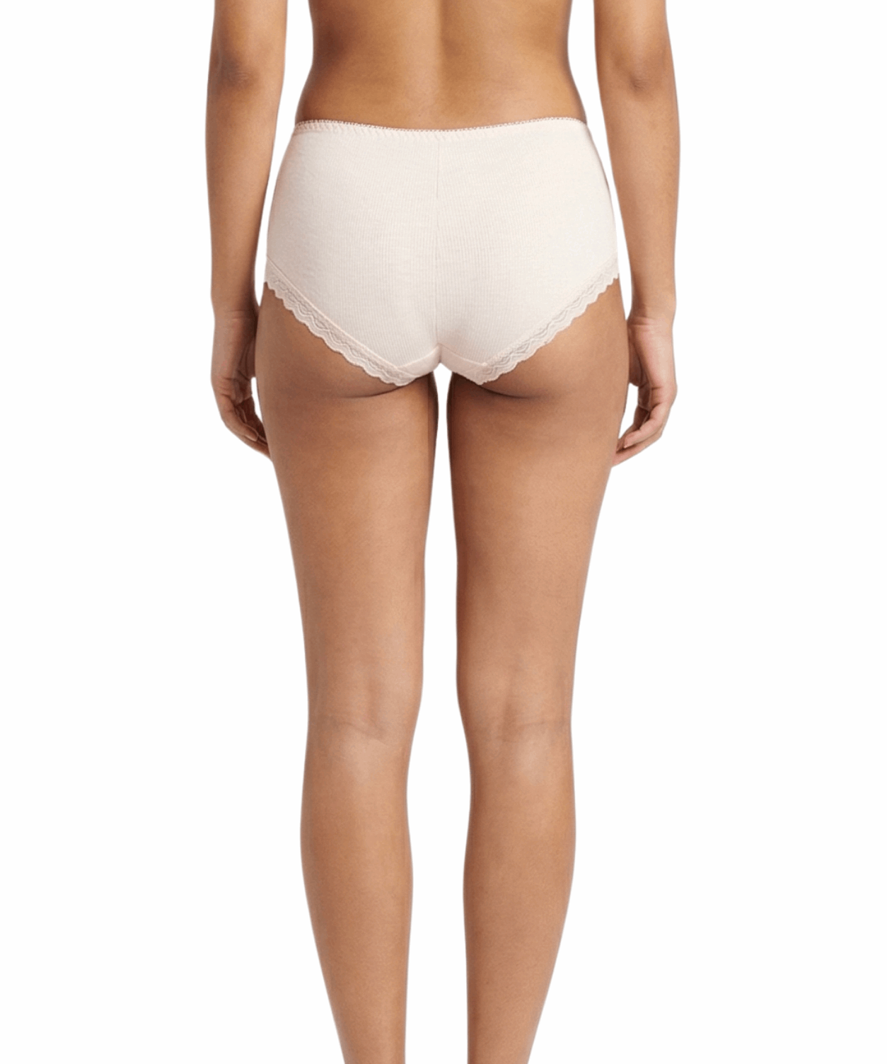 Woman wearing a beige panty on a white background