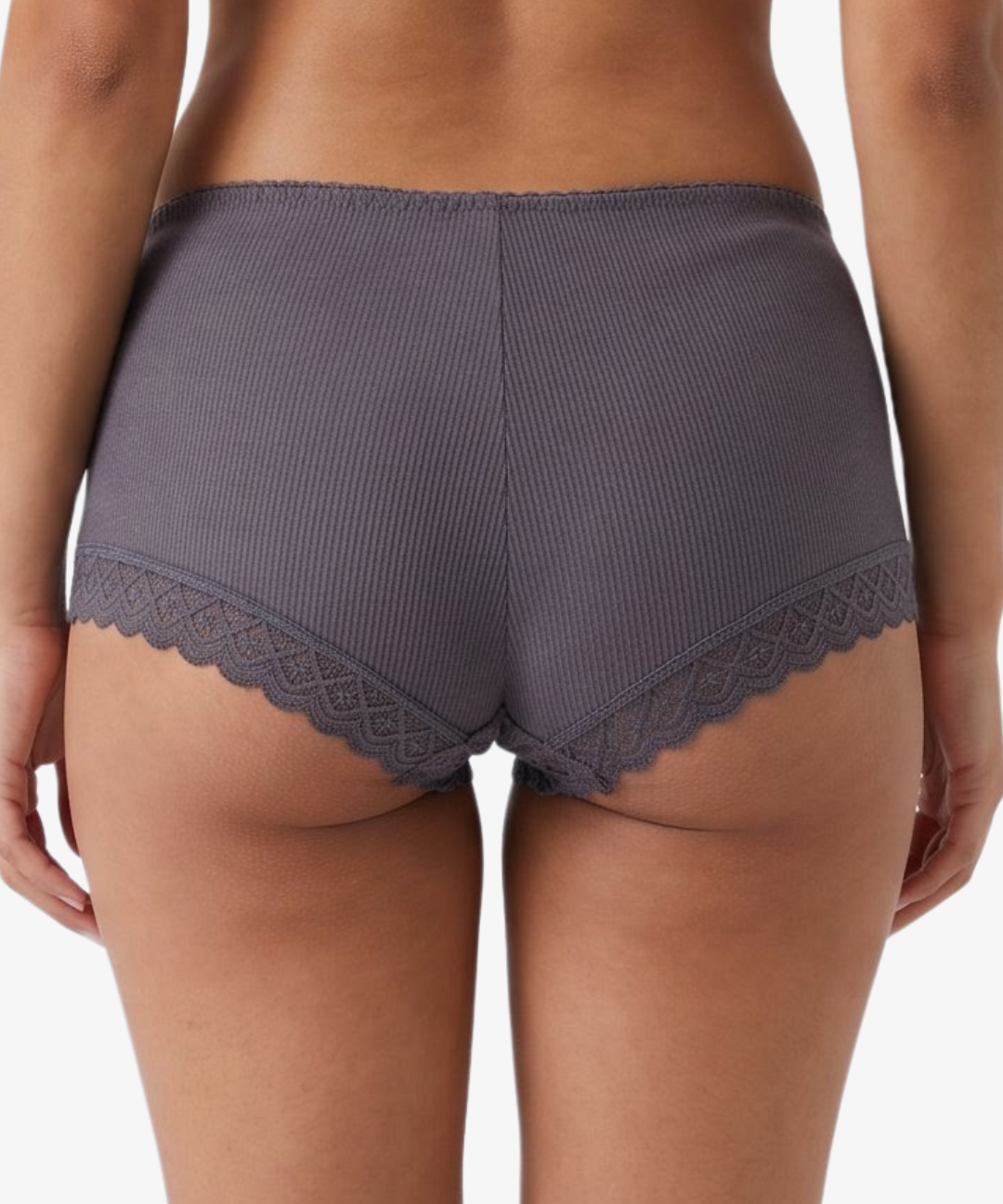 Rear view of a model wearing ribbed boyleg grey underwear with scalloped lace trim at the leg openings, against a plain light background.