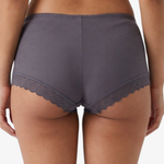 Rear view of a model wearing ribbed boyleg grey underwear with scalloped lace trim at the leg openings, against a plain light background.