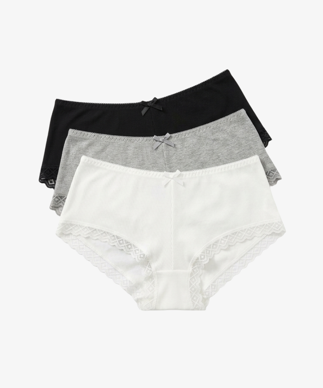 Three pairs of women's high-waisted briefs stacked together on a light gray background. The front pair is white with lace trim and a small bow at the center, the middle pair is heather gray, and the back pair is solid black.