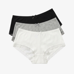 Three pairs of women's high-waisted briefs stacked together on a light gray background. The front pair is white with lace trim and a small bow at the center, the middle pair is heather gray, and the back pair is solid black.