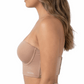 Woman wearing a beige longline bra on a white background