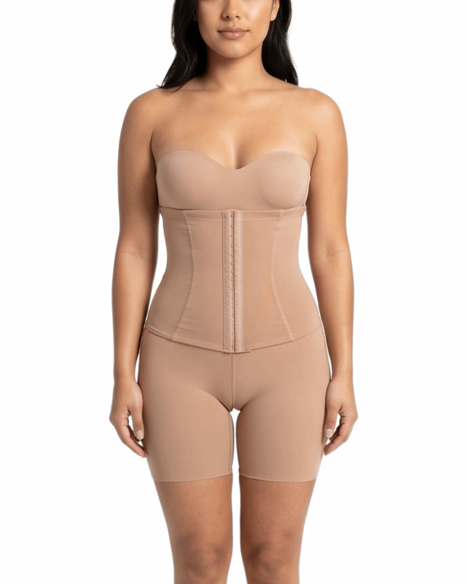 Woman wearing a beige shapewear bodysuit on a white background