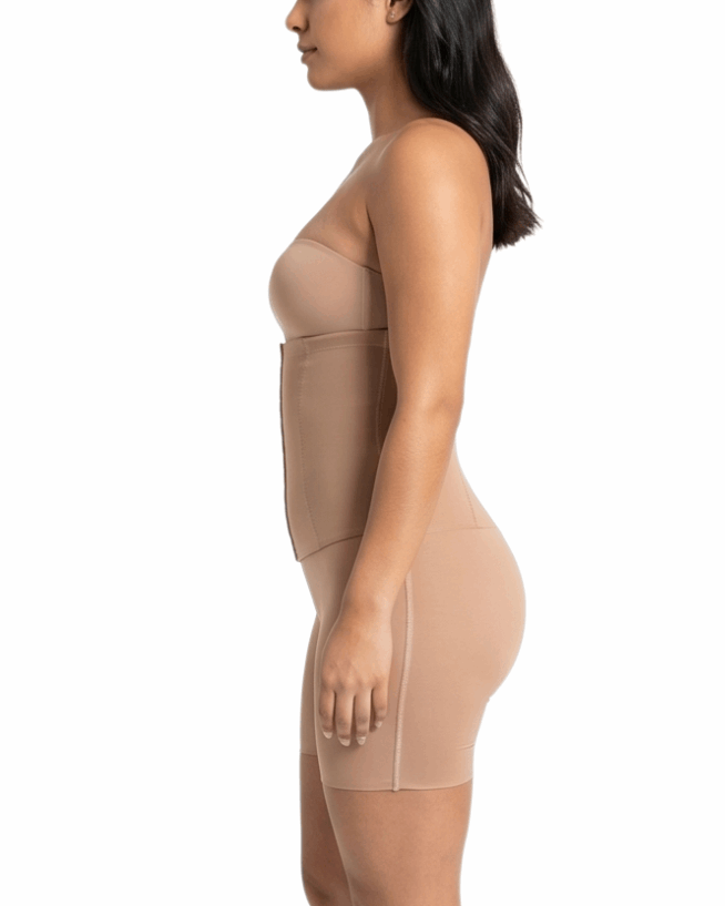 Woman wearing a beige shapewear garment on a white background