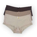 Three pairs of women's underwear, one brown, one mocha, and one beige, on a white background.