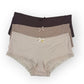 Three pairs of women's underwear, one brown, one mocha, and one beige, on a white background.