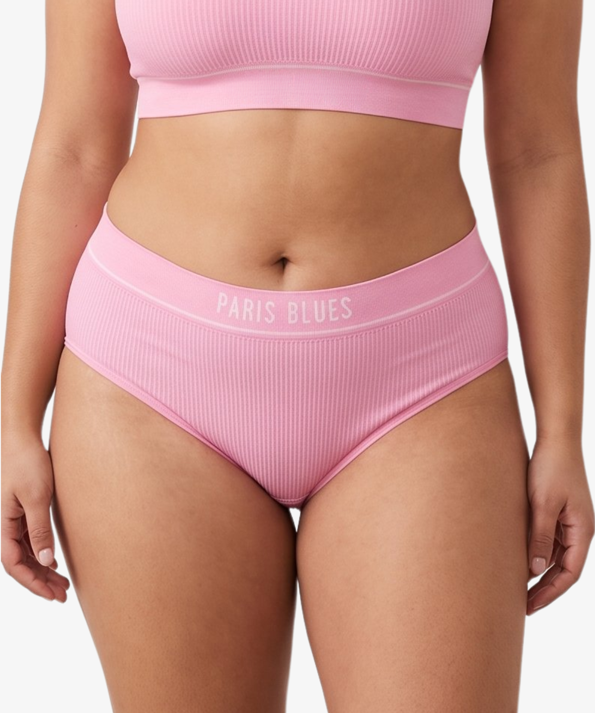 A woman modeling a ribbed high-waisted bikini with 'PARIS BLUES' printed on the waistband, against a light gray studio background.