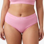 A woman modeling a ribbed high-waisted bikini with 'PARIS BLUES' printed on the waistband, against a light gray studio background.