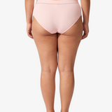 A model wearing a light pink ribbed high-waisted bikinis, featuring the brand name 'PARIS BLUES' printed on the waistbands, against a light gray background.