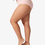 A model wearing a light pink ribbed high-waisted bikinis, featuring the brand name 'PARIS BLUES' printed on the waistbands, against a light gray background.