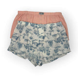 Floral-patterned boxer brief and a pink boxer brief on a white background