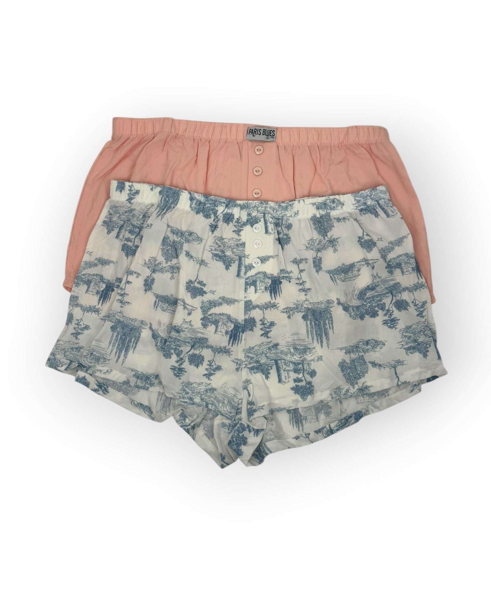 Floral-patterned boxer brief and a pink boxer brief on a white background