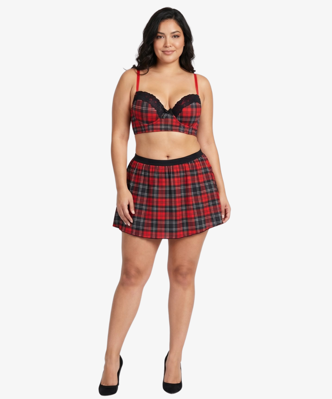 Plus size woman wearing a red and black plaid top and skirt on a white background