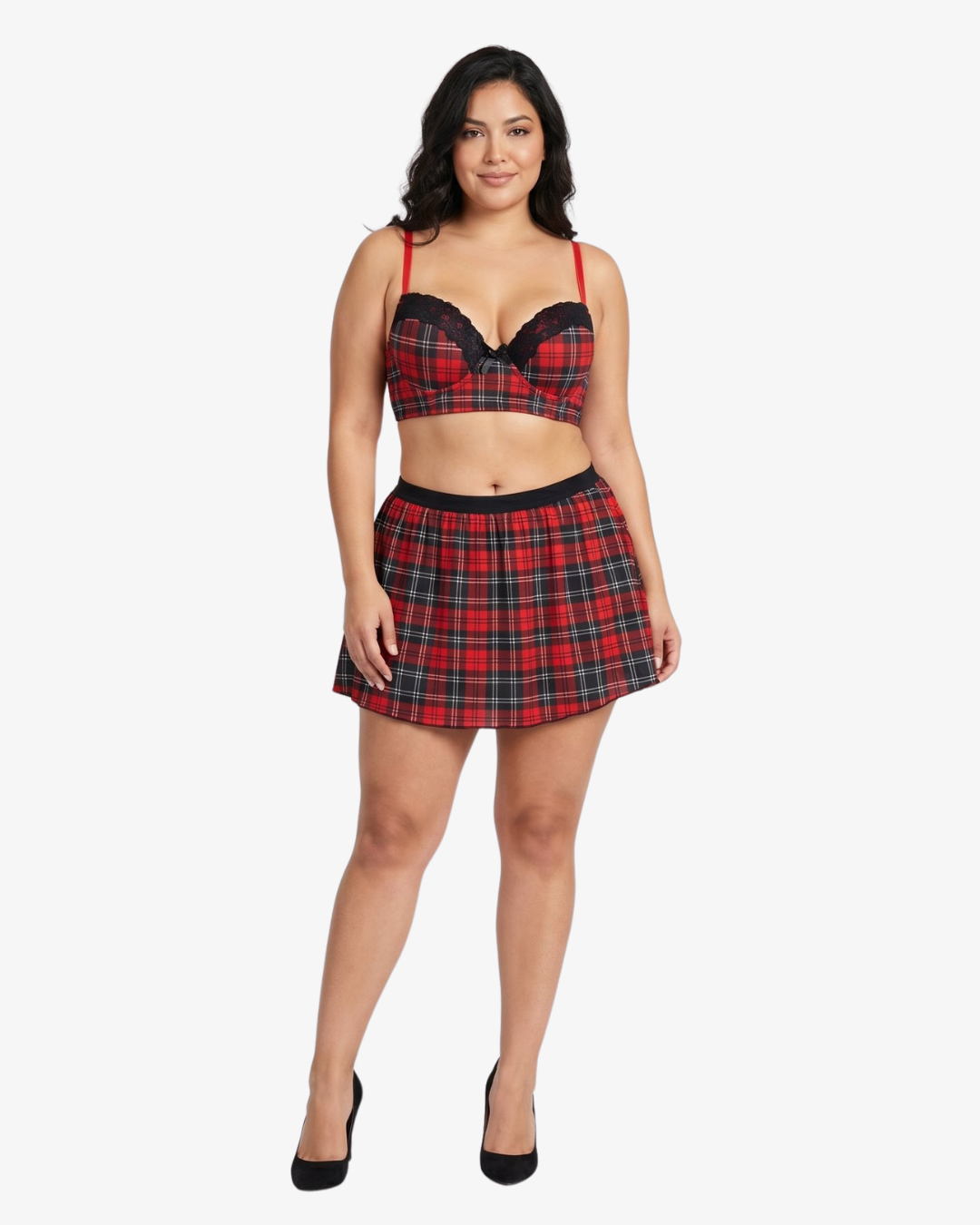 Plus size woman wearing a red and black plaid top and skirt on a white background
