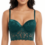 Woman wearing a green lace bra on a white background