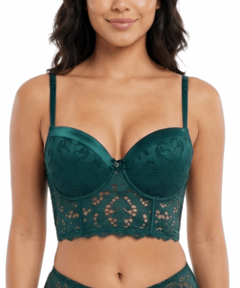 Woman wearing a green lace bra on a white background