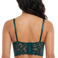 Woman wearing a green lace bra on a white background