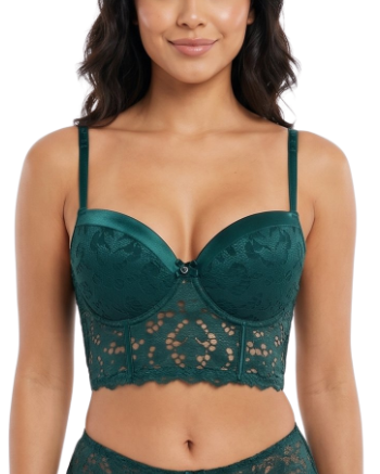 Woman wearing a green lace bra on a white background