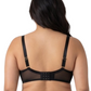 Woman wearing a black lace bra on a white background