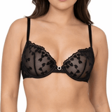 Woman wearing a black lace bra on a white background