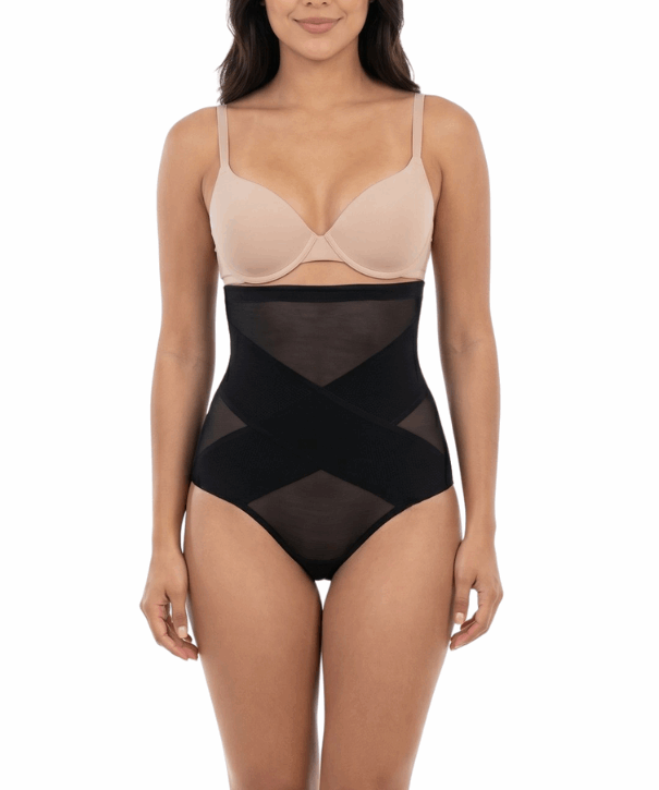 Woman wearing a black shapewear on a white background
