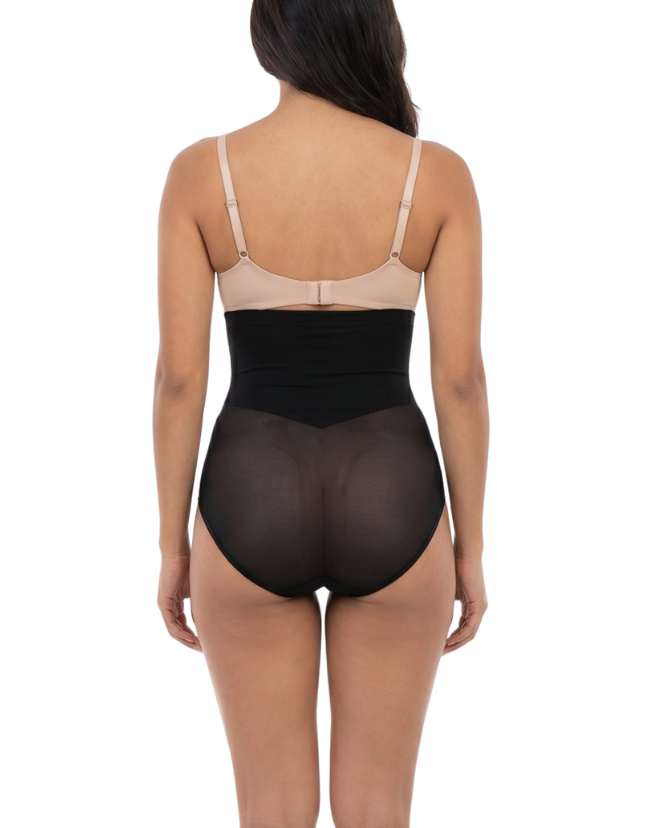 Woman wearing a black shapewear on a white background