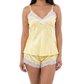 Woman wearing a yellow satin nightgown with lace trim on a white background