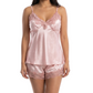 Woman wearing a pink satin nightgown on a white background